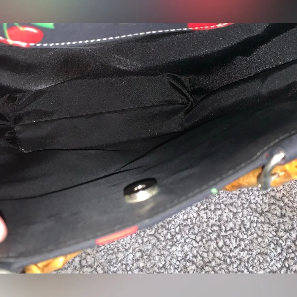 Black purse with red cherries and bamboo handles large